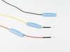 PRO-E3: Protectrode® - Neonatal EEG or aEEG Needle Electrodes, Blue Cap Protectrode Baby Blue Safety Cap showing sheathed black needle, partially retracted yellow , and fully retracted red PRO-E3