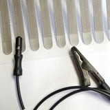 Hydrogel ring electrode next to alligator clip lead-wire in black